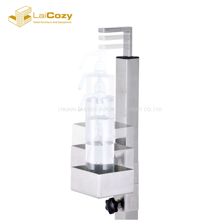 Soporte dispensador de desinfectante de manos con pedal de acero inoxidable 